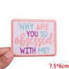 Pink embroidered patch with light blue and purple text asking Why are you so obsessed with me?
