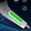 A close-up view of a silver electric spin scrubber with green brush heads and icons indicating features.