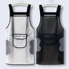 A pair of black waterproof kitchen aprons with mesh pockets and gray accents hanging on a rack.