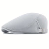 A light gray men's breathable mesh newsboy cap shown from the side.