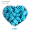 A pile of light blue silicone crown star heart beads for DIY jewelry making