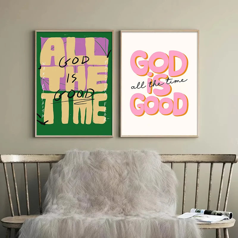 A set of two framed canvas prints featuring the text All God Is The Good Time in bright yellow and pink lettering on a green 