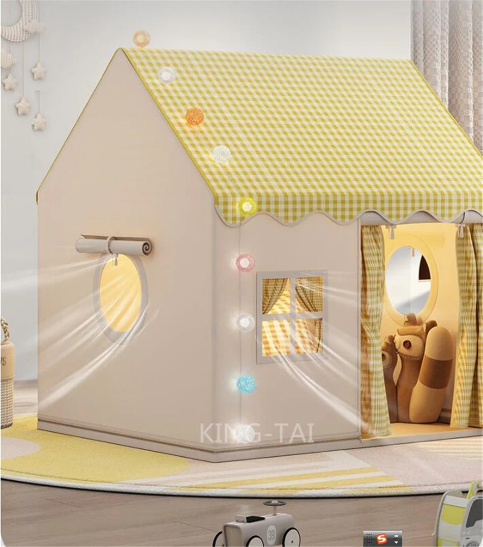 A beige play tent shaped like a house with a yellow checkered roof and decorative elements for children.