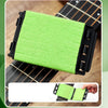 A bright green microfiber cleaning cloth is shown placed on a guitar fretboard.