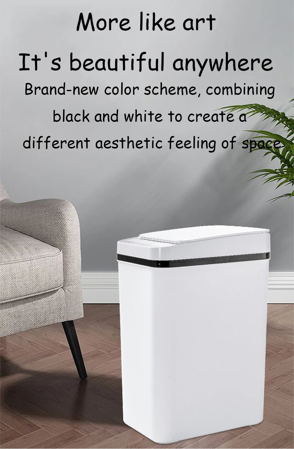 A white touchless motion sensor trash can with a black lid sitting on a wooden floor.