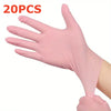 A hand wearing a pink disposable nitrile glove is shown, with the text 20PCS visible.