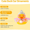 A yellow rubber duck decoration wearing a crown, sunglasses, and a pearl necklace for car or table decor.
