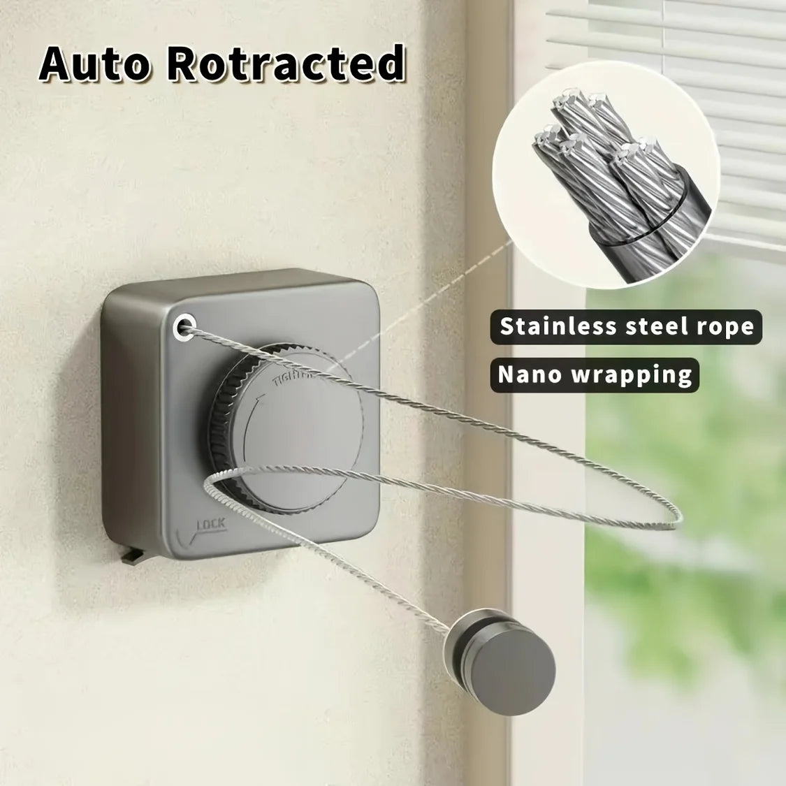 A gray auto retractable stainless steel rope clothesline mounted on a wall, showing the rope and storage mechanism.