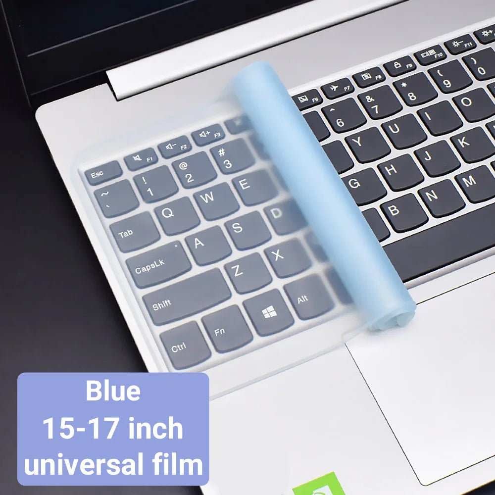 Blue universal film keyboard cover for a laptop, showing the silicone skin protecting the keys.