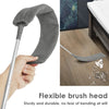 A hand holds a silver cleaning rod with a flexible gray brush head, demonstrating the duster's use.