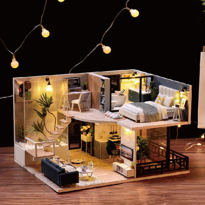 A detailed wooden dollhouse miniature building kit featuring furniture and lighting displayed on a wooden surface.