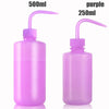 Two purple tattoo squeeze bottles, one 500ml and one 250ml, with precision tips.