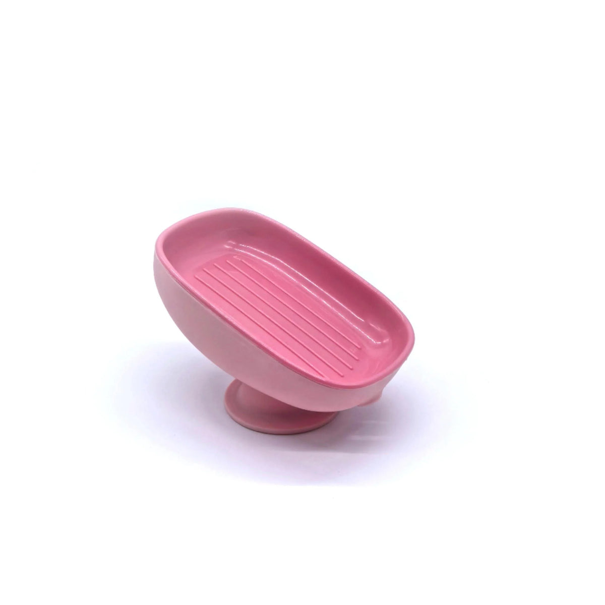 A pink leaf-shaped suction cup soap dish for bathroom and shower.