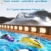 A collection of orange and yellow stunt remote-controlled speedboats racing through blue water.