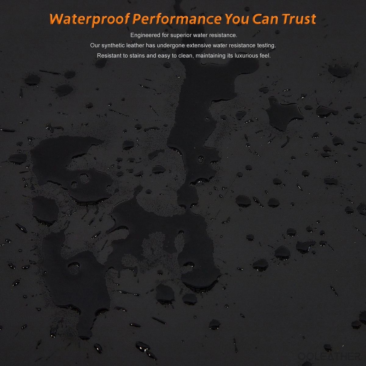 Close-up of dark faux leather material showing water resistance and stains on a surface.