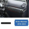 Carbon fiber trim kit for Toyota 4Runner featuring a textured black grille piece.