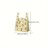 A set of mini fruit-print tote bags with handles, featuring various fruit designs.