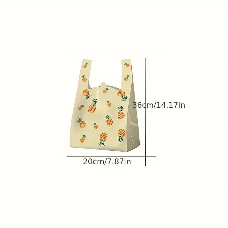 A set of mini fruit-print tote bags with handles, featuring various fruit designs.