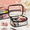Clear transparent storage bag with zipper for toys, cosmetics & travel next to a brush.