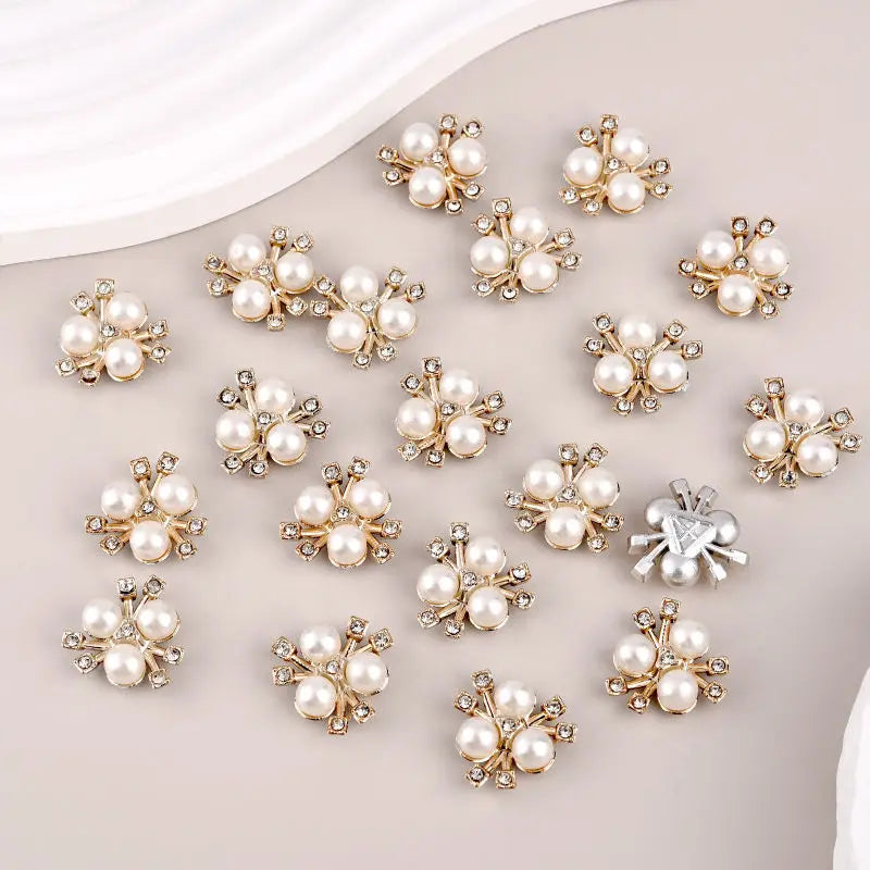 A collection of pearlized resin flower beads in various sizes and clusters for DIY jewelry making.