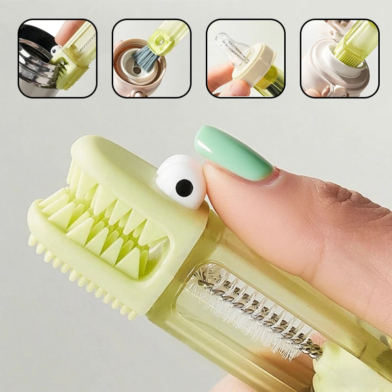 A hand holds a light green multi-purpose cleaning brush set with various attachments for bottles and cups.