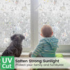 A child looks out a window covered with UV cut film, protecting the view and furniture.