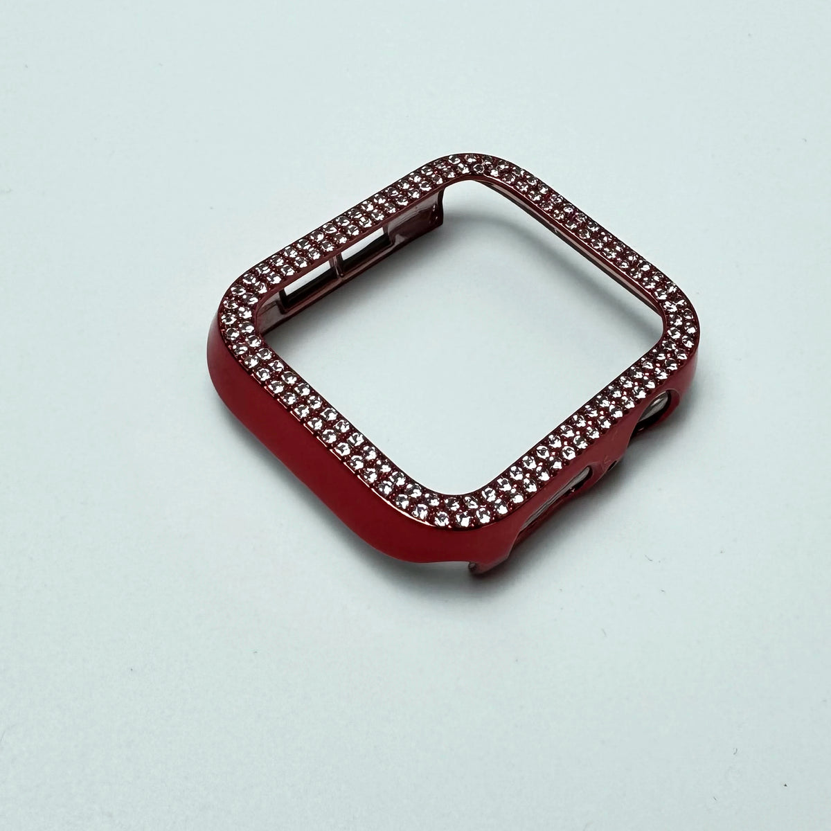 Funda de vinilo con pedrería brillante roja para Apple Watch, vista desde arriba.