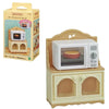 A wooden toy kitchen set featuring a white microwave oven and storage compartments for Sylvanian Families Forest Friends figu