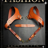 A pair of brown leather double shoulder suspenders displayed against a dark background.