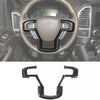 Carbon fiber grain center console trim cover for Ford F-150 vehicle interior.