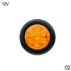 A round amber LED tail light assembly for a 12V vehicle.