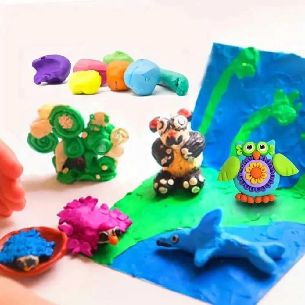 A collection of brightly colored air dry clay pieces and tools laid out on a white surface.
