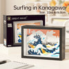 A framed painting of a surfing scene in Kanagawa featuring blue and white waves and orange accents.