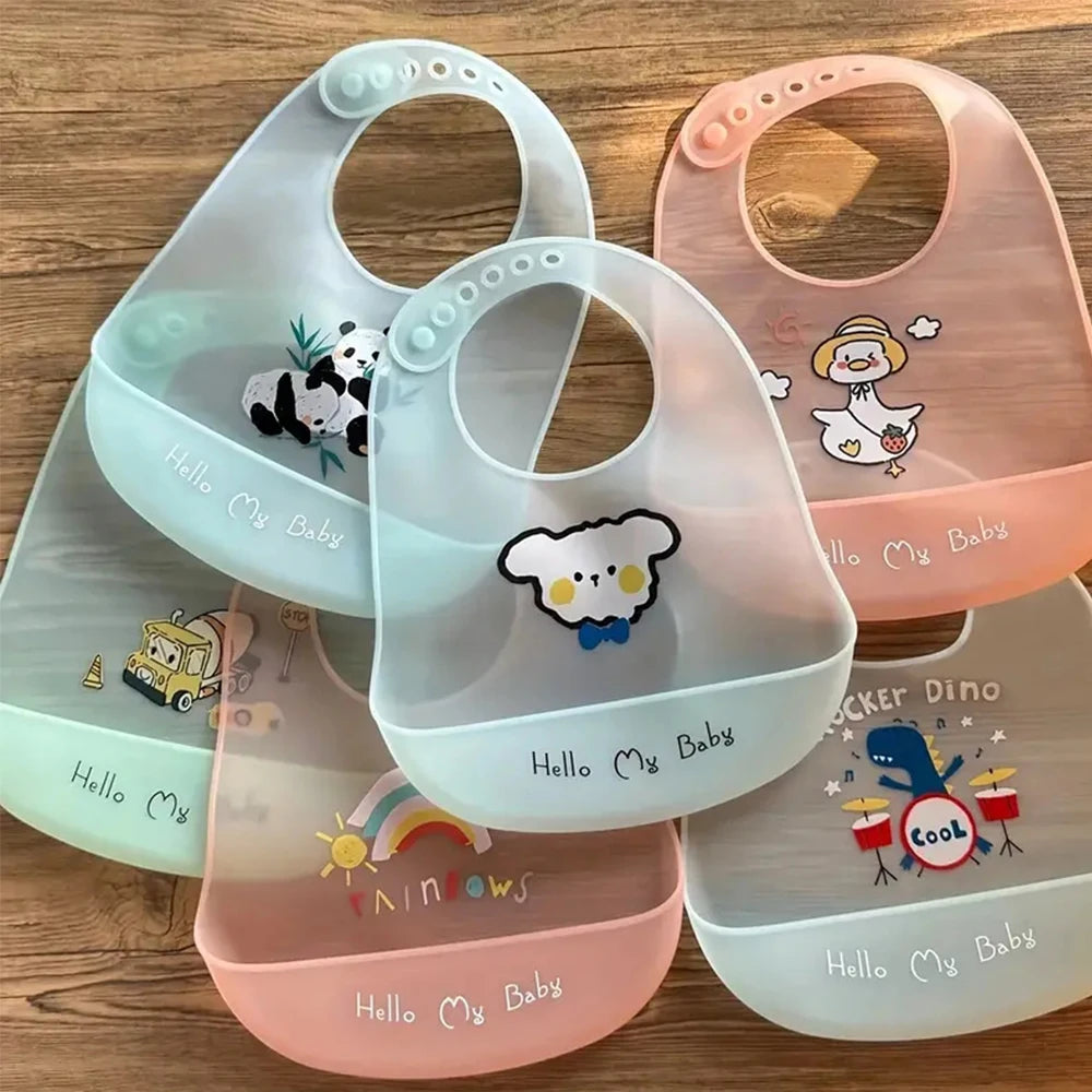 A collection of five adjustable soft silicone baby bibs featuring various cute cartoon animal prints in pastel colors.