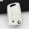 A white TPU car key cover for VW, SEAT, and Skoda models shown against a dark background.