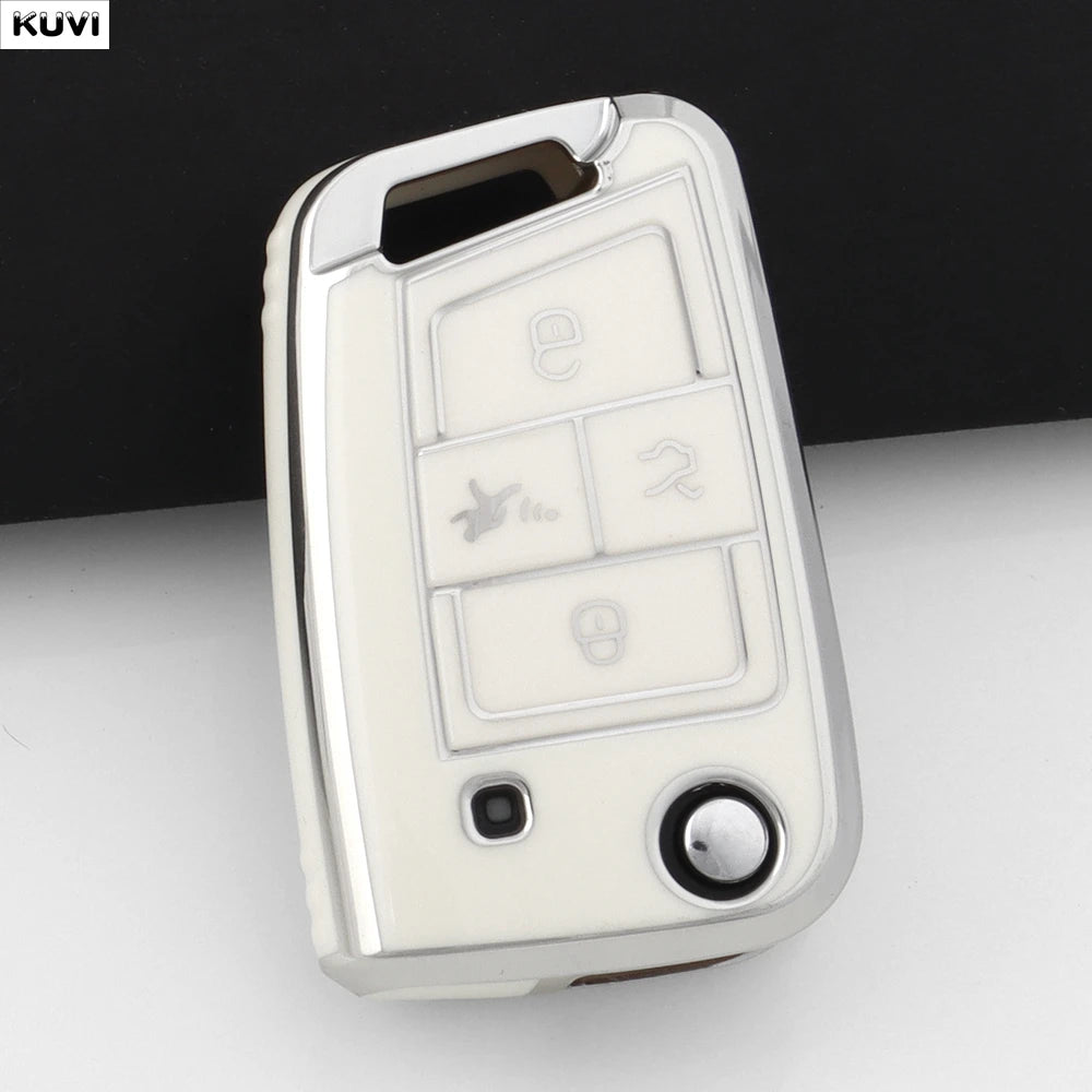 A white TPU car key cover for VW, SEAT, and Skoda models shown against a dark background.