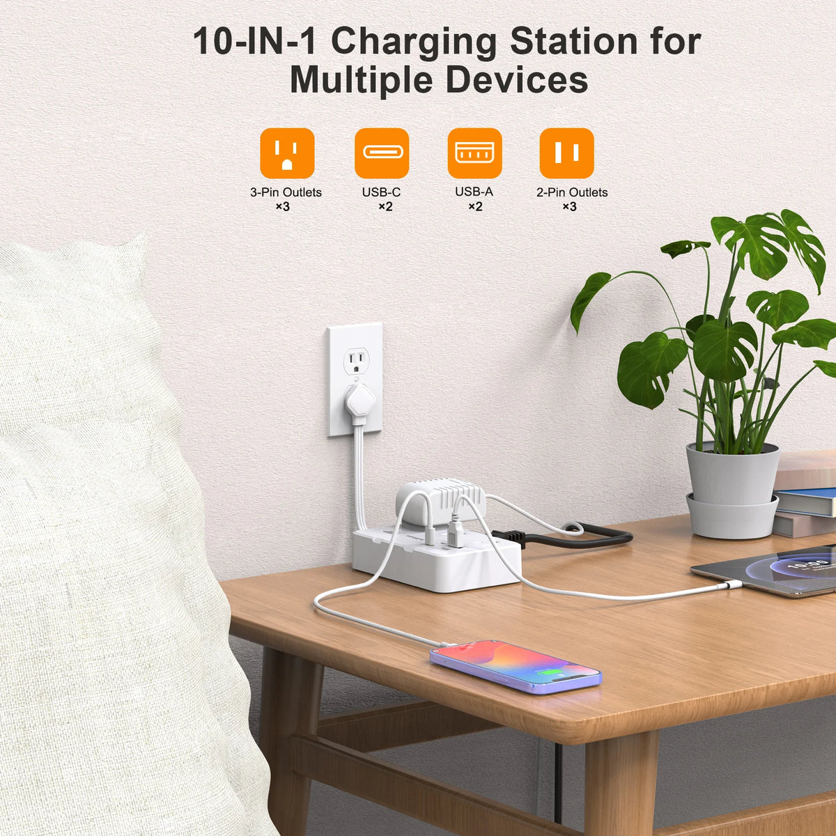 A white 10-in-1 charging station with multiple outlets and cables resting on a wooden table.