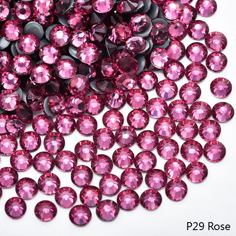 Close-up of pink and magenta rhinestones used for DIY crafts and clothing decoration