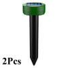 A green and black solar-powered ultrasonic animal repellent device.