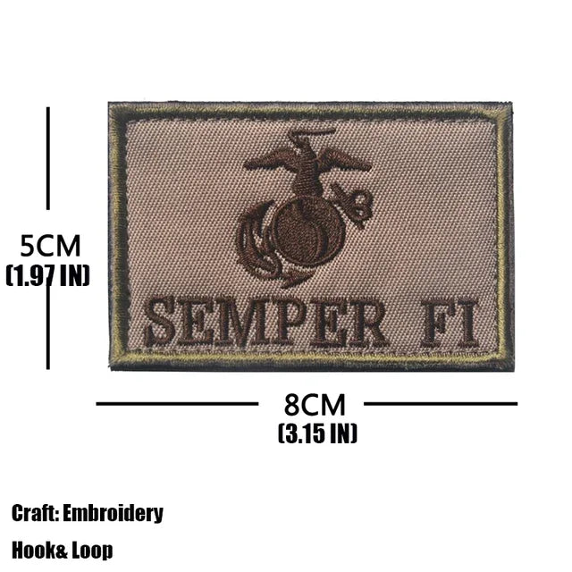 A rectangular embroidered tactical patch featuring an eagle emblem and the text SEMPER FI on a tan background.