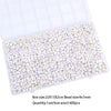 A box containing 1400 acrylic letter beads in a grid storage tray for jewelry making
