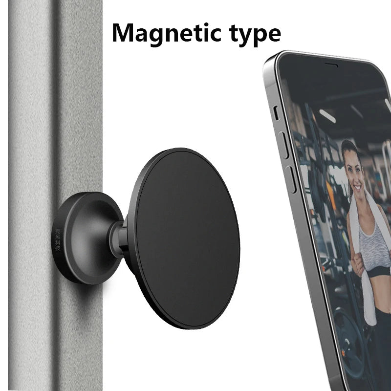 A black magnetic type phone holder attached to a wall, shown next to an iPhone screen.