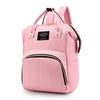 Pink insulated canvas mummy diaper bag with a hanging hook and zippered pockets