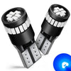 A pair of black LED bulbs with white light, used for replacement in a device.