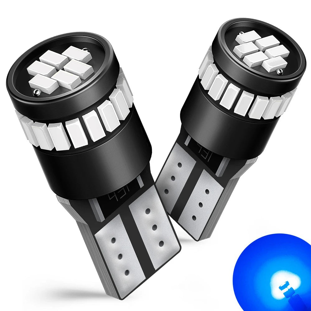 A pair of black LED bulbs with white light, used for replacement in a device.