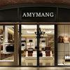 A display of soft leather plaid crossbody bags in various colors and styles inside a retail shop.