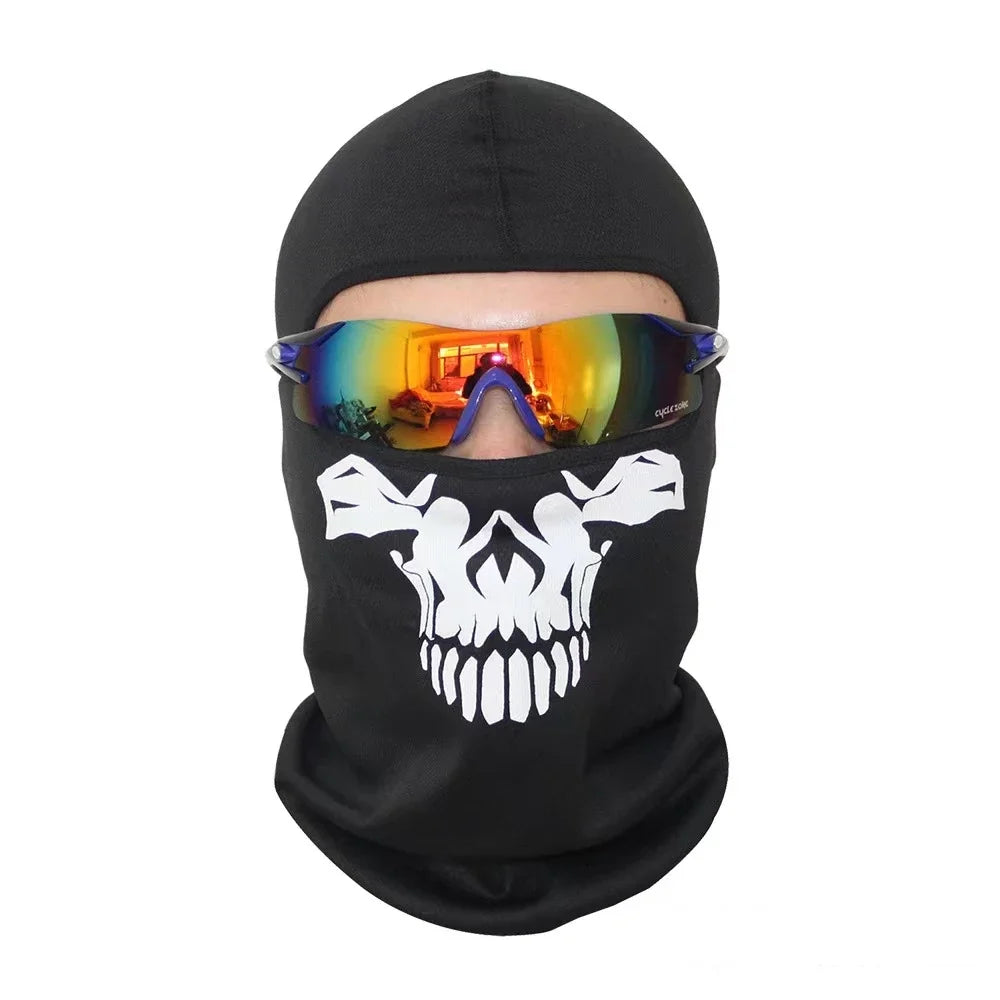 Black full face balaclava with a white skull print and mirrored orange-yellow goggles.