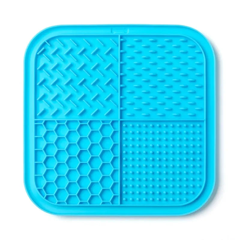 Blue silicone lick mat for dogs and cats with suction cups, divided into four sections.