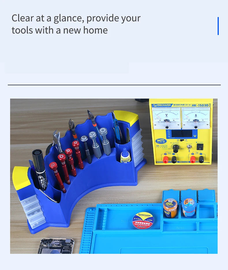 A blue desktop organizer rack holds various repair tools and electronics, next to a yellow multimeter.