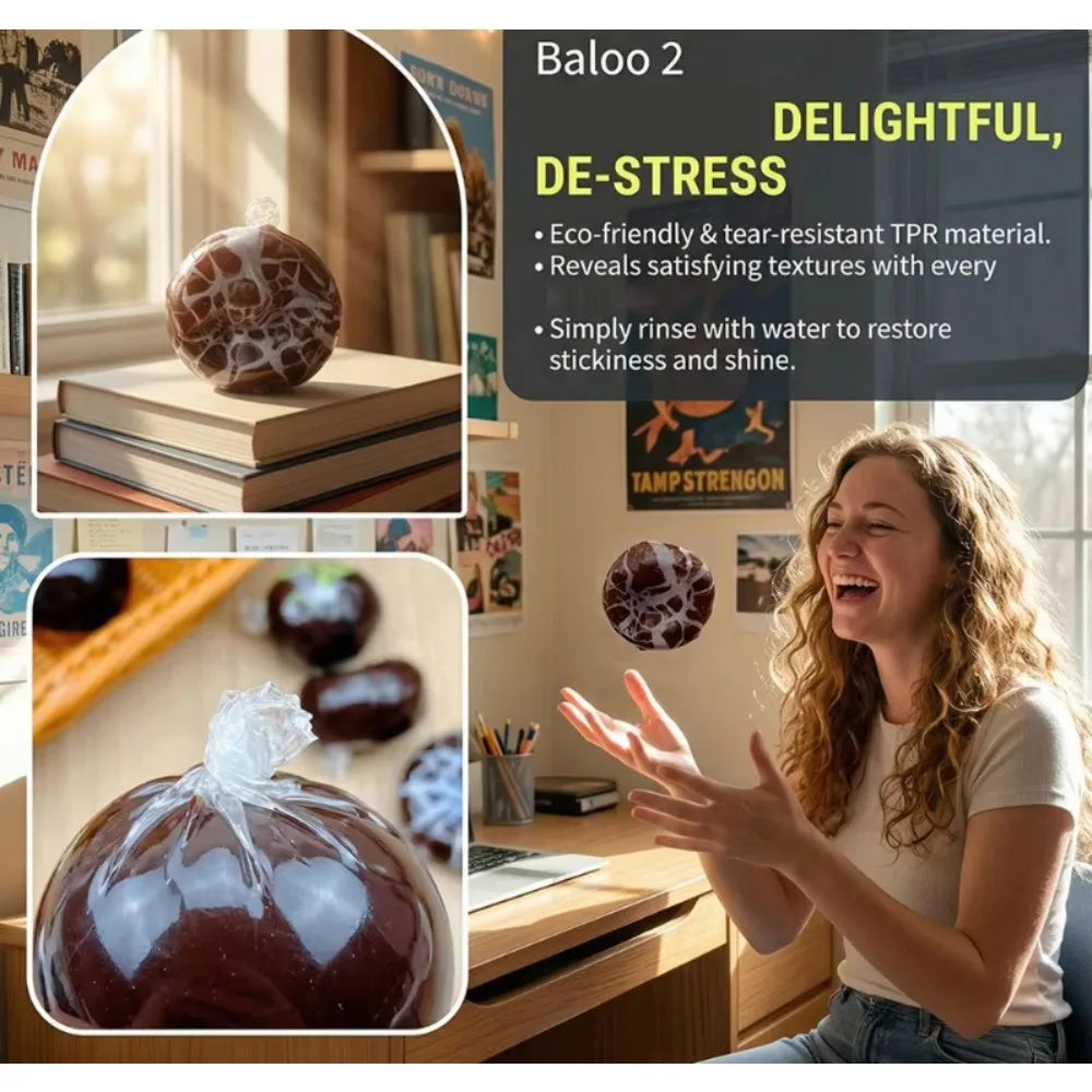 A woman is smiling while squeezing a dark brown squishy stress ball, demonstrating its delightful and de-stressing qualities.